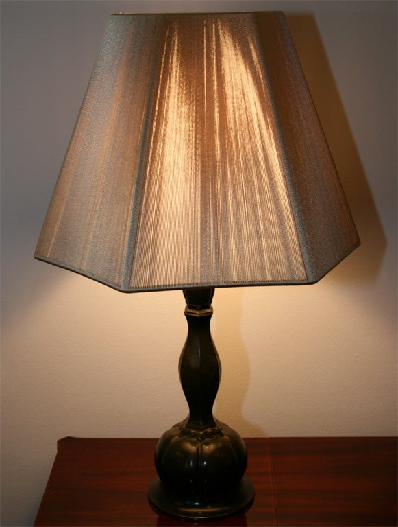 Patinated-disko metal Lamp by Just Andersen (1884-1943).<br />
Numbered  D80, Signed and monogrammed: Just
