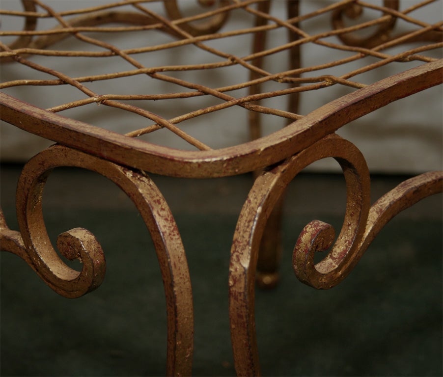 Set of four Jean-Charles Moreux gilt metal chairs