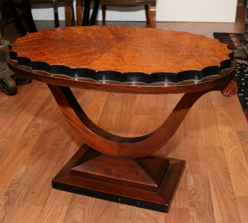 An American Art Deco side table by Dynamique Creations, in mahogany and bird's-eye burl walnut veneer, from circa 1920s.