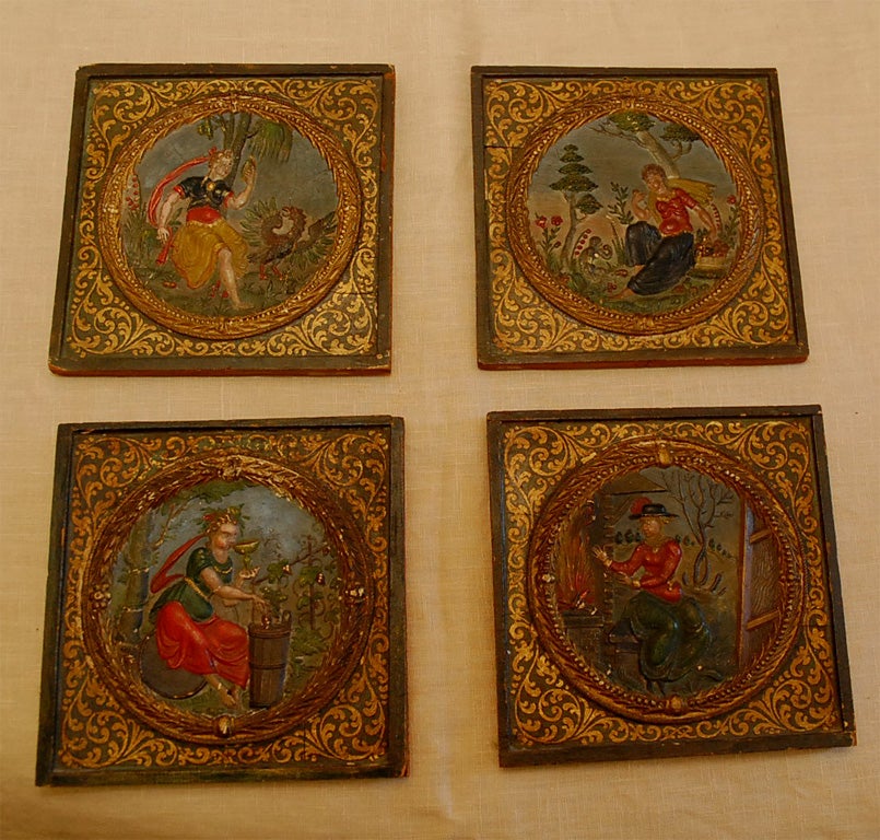 Set of 4 polychrome miniature oil paintings  on wood