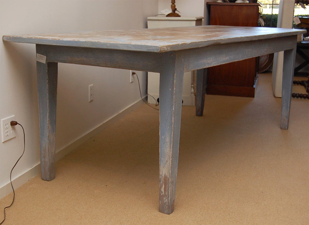 A large Farm Dining Table made of 19th Century Sycamore wood, painted with a  Lincolnshire blue antique finish, seats ten.