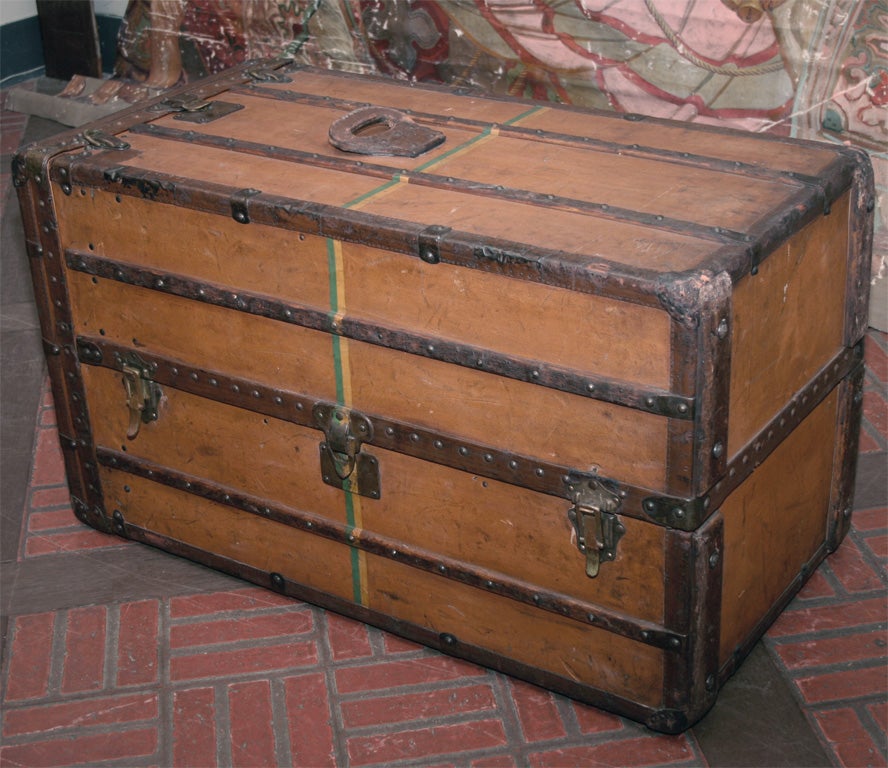 Louis Vuitton Steamer Trunk / Wardrobe in Vuittonite (rare un-monogrammed leather covering originally designed for the Russian royal family) retailed by Marshall Field & Co. with near original interior and hangers. Prov: William McCormick Blair