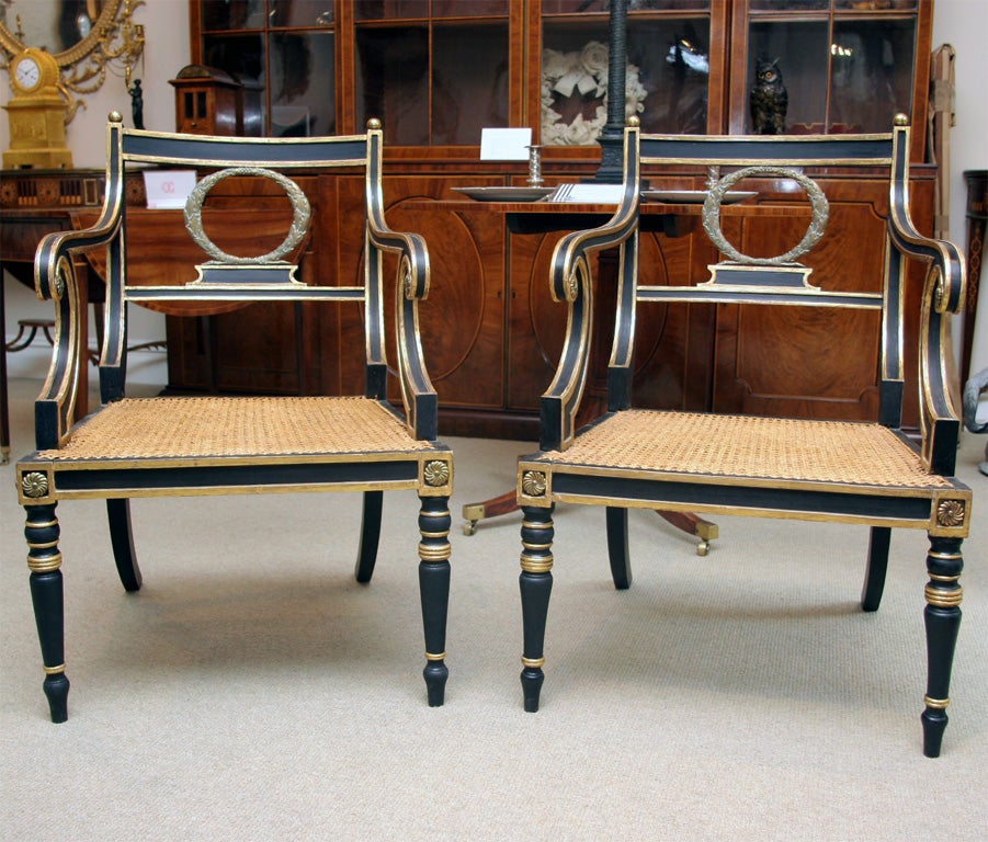Pair of parcel gilt  Regency period armchairs