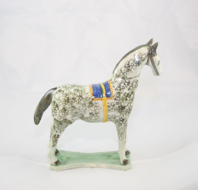 English pearlware horse decorated in underglaze Pratt colors