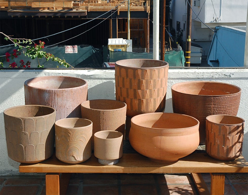 Large selection of unglazed ceramics by David Cressey with various textures and sizes.