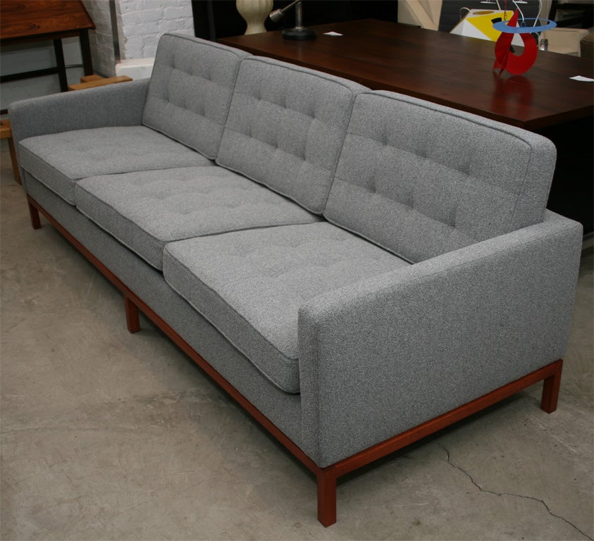 20th Century Florence Knoll 3 seat quilted sofa with wood base