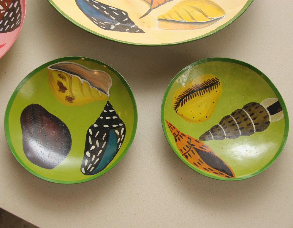 Handpainted copper plates from Madagascar.