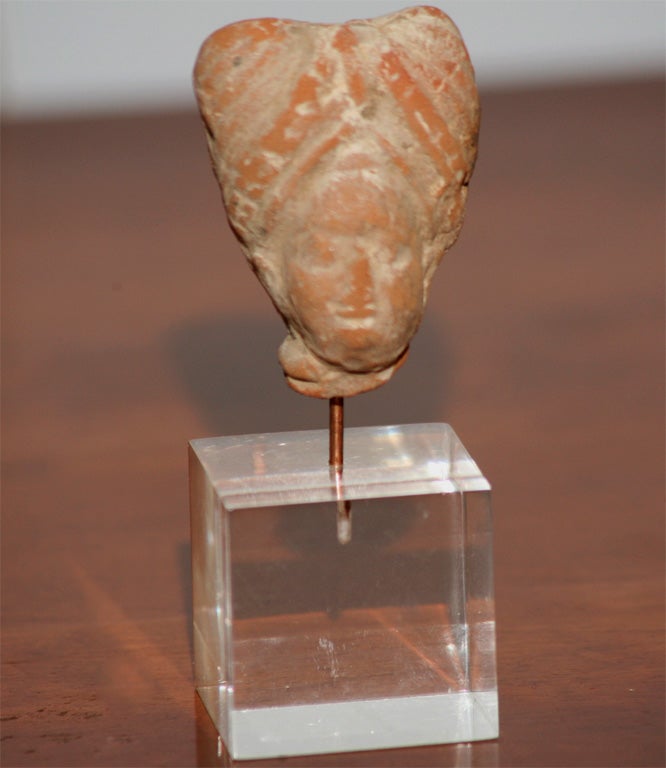 A Set of Ancient Pottery Busts 4