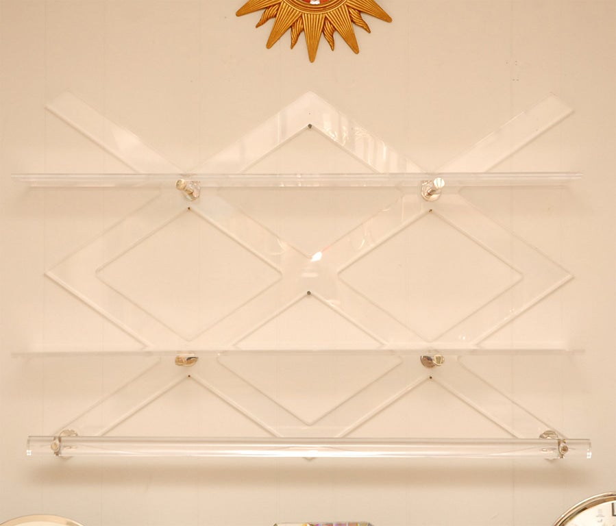 A functional vintage towel rack with shelves by Charles Hollis Jones. This would be perfect in a master bath. Signed and dated 1969.