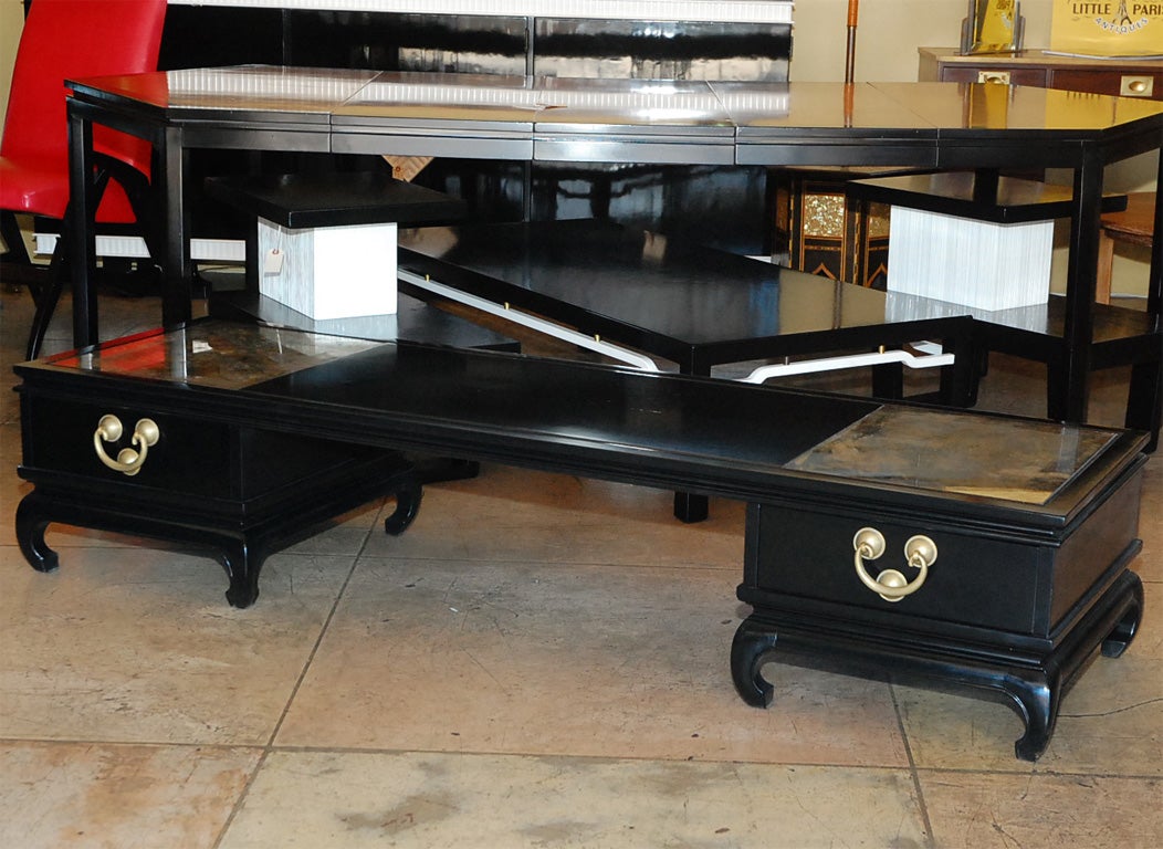 LONG AND LOW BLACK LACQUER ASIAN STYLE BENCH. WITH BRASS HARDWEAR. TWO DRAWERS ON EACH END. TOP IT WITH ANTIQUED MIRROR.