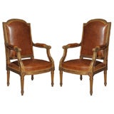 Early 20th Century Pair of Handcarved Giltwood Fauteuils