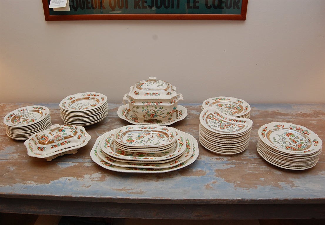 An unusual set of Copelands China in Peonies Pattern #240794 made by Spode especially for the famous London china shop, Thomas Goodes on 19th South Audley Street (stamped on the back).  The 67 pieces include: 4 platters, 21 dinner plates with a