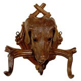 Carved Black Forest Dog Head Coat Rack