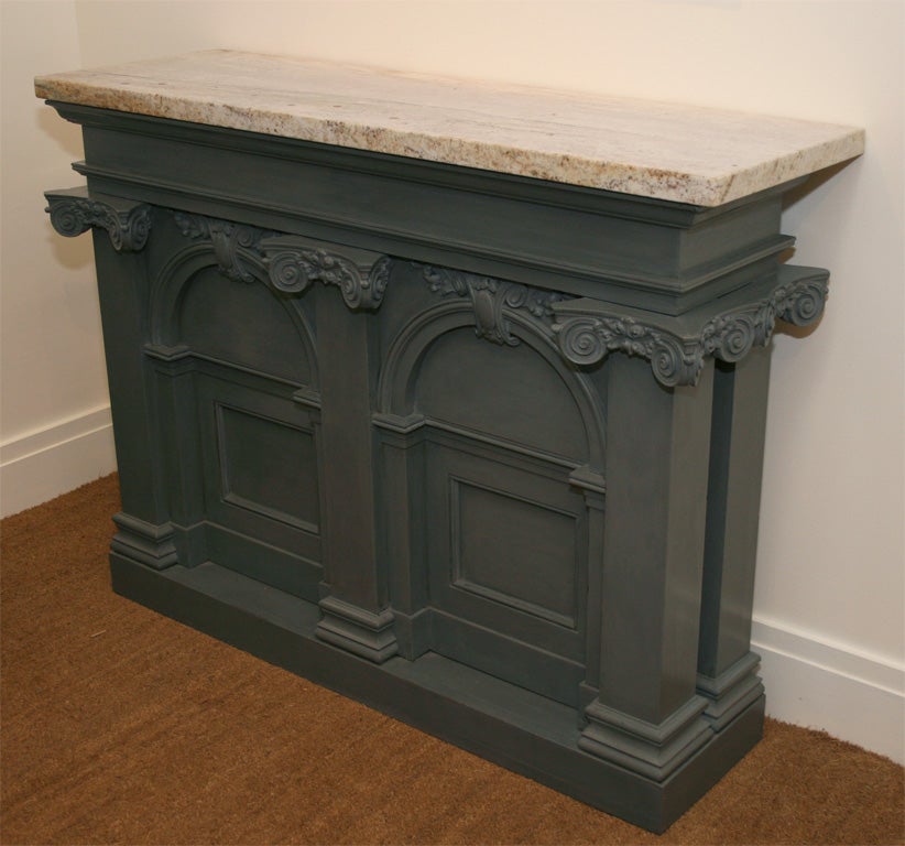 Pair of painted architectural cabinets with stone tops.