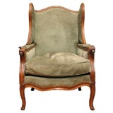 Louis XV carved walnut reclining wing chair, c.1750