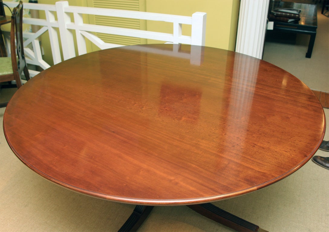 Regency An exceptional hand made mahogany round dining table with semi-circular leaves. For Sale