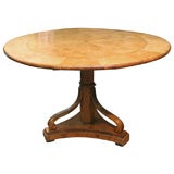 Antique Biedermeier circular tilt-top table.