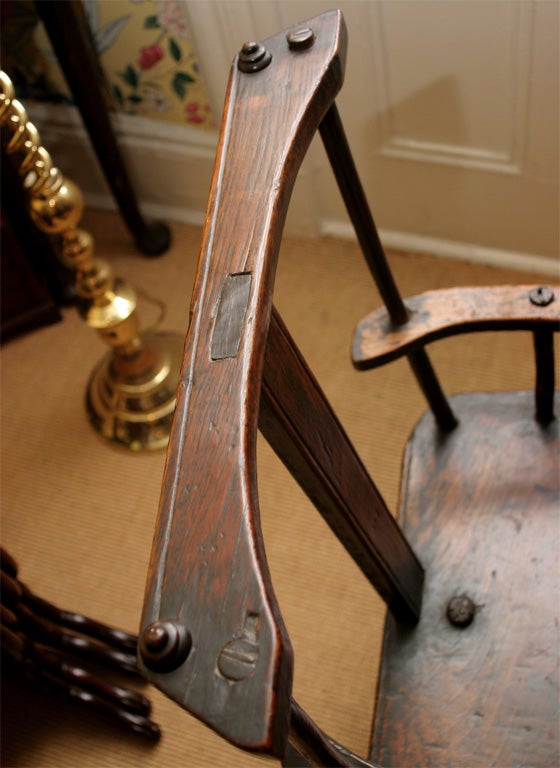 A rare English elmwood and oak three legged shepherd's chair. 3