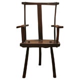 Antique A rare English elmwood and oak three legged shepherd's chair.