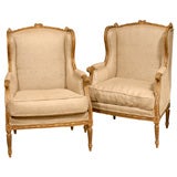 Faded gilt pair bergeres