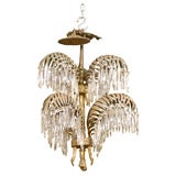 Bronze chandelier with palm leaves