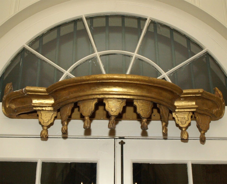 A gilt wood bed corona/