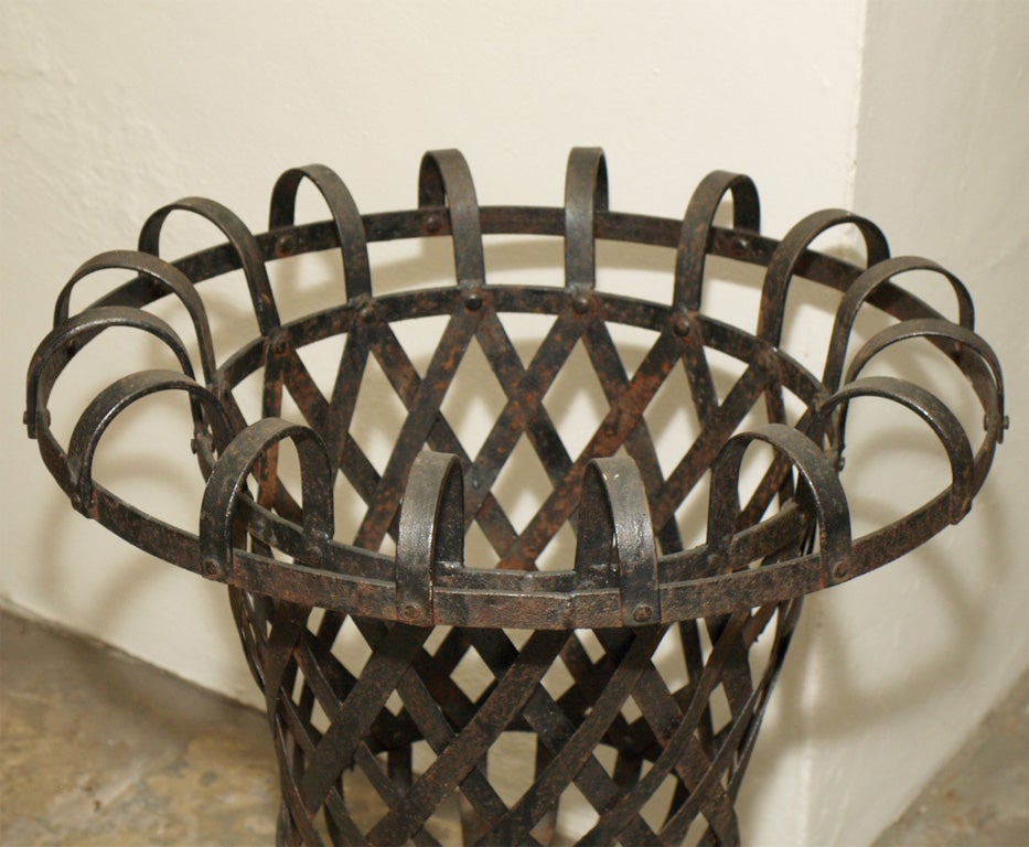 8202 A PAIR OF METAL URN SHAPED PLANTERS at 1stDibs