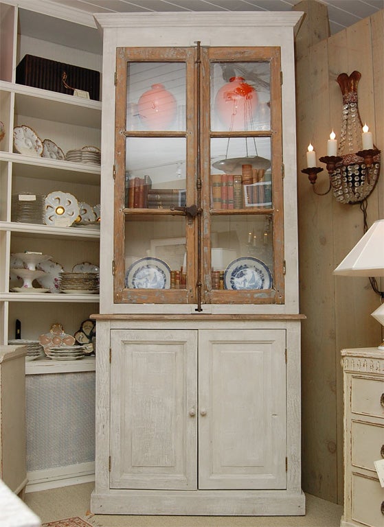 Beautifully constructed 2-piece Bakers cabinet with glass doors and bottom cabinet