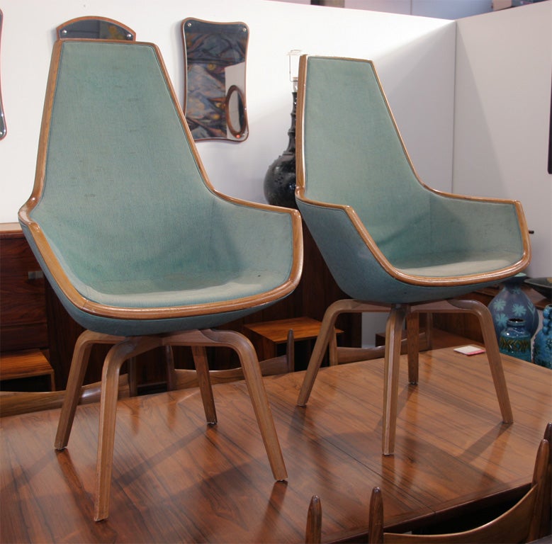 A pair of extremely rare giraffe chairs designed by Arne Jacobsen. These chairs were produced only once as dining chairs for the SAS Royal Hotel. 33 Jay Street, Brooklyn, NY.