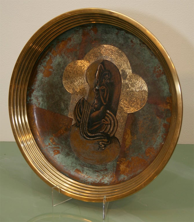 A Copper and Bronze Inlaid Plate by WMF