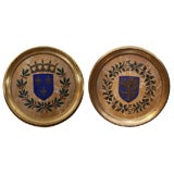 A Pair of Brass Mounted Armorial Plaques