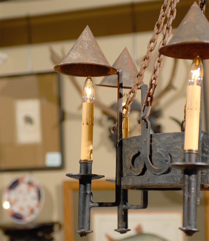 French iron chandelier with six lights and cone shades