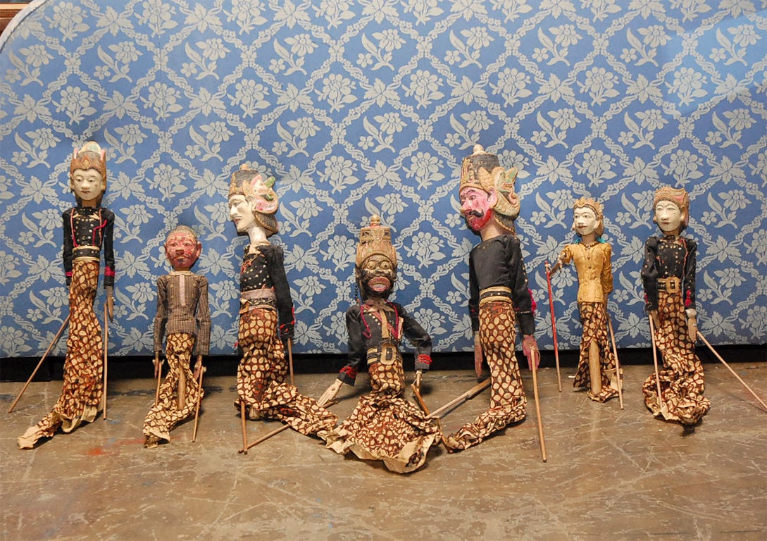 wood carved polychrome faces with Batik  textile  dresses - one monkey puppet 