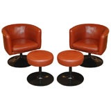 Mid-Century Swivel leather Arm Chairs with Ottomans
