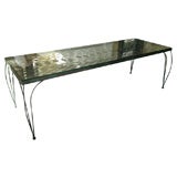 Iron and glass garden table.