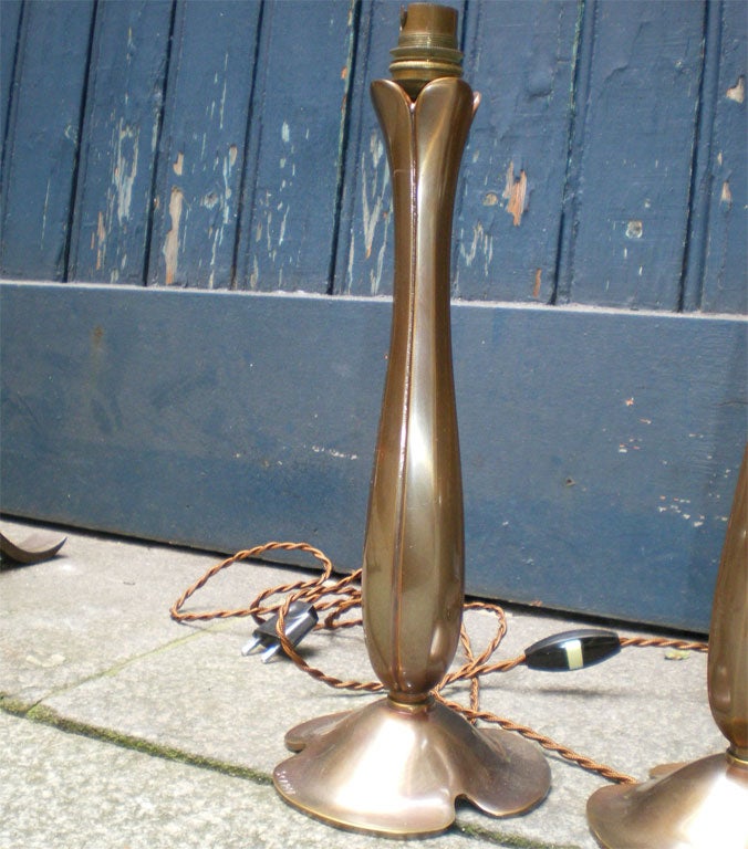 Two bronze lamps signed on the base by Scarpa, re-patinated in medal tone.