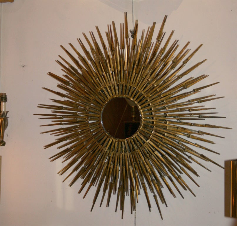 Gilt Decorated Sculptural Sunburst Mirror, American, 1970's 1
