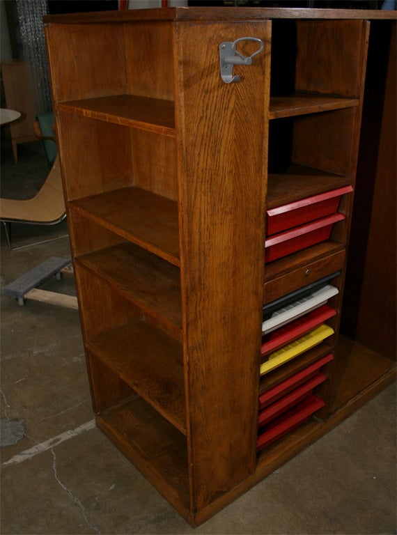 Le Corbusier and Charlotte Perriand. A Painted Metal and Oak Storage Unit.