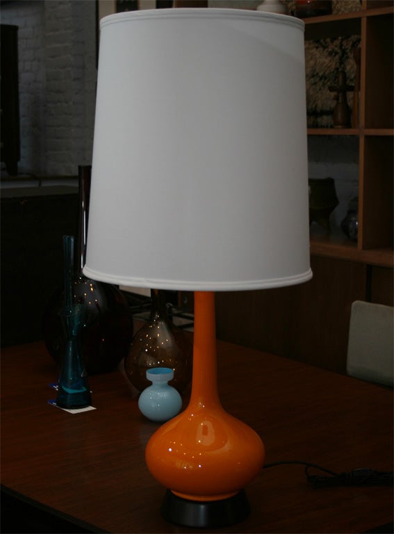 Orange crackle glazed ceramic lamp with black painted wood base
