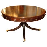 George III English mahogany drum table.