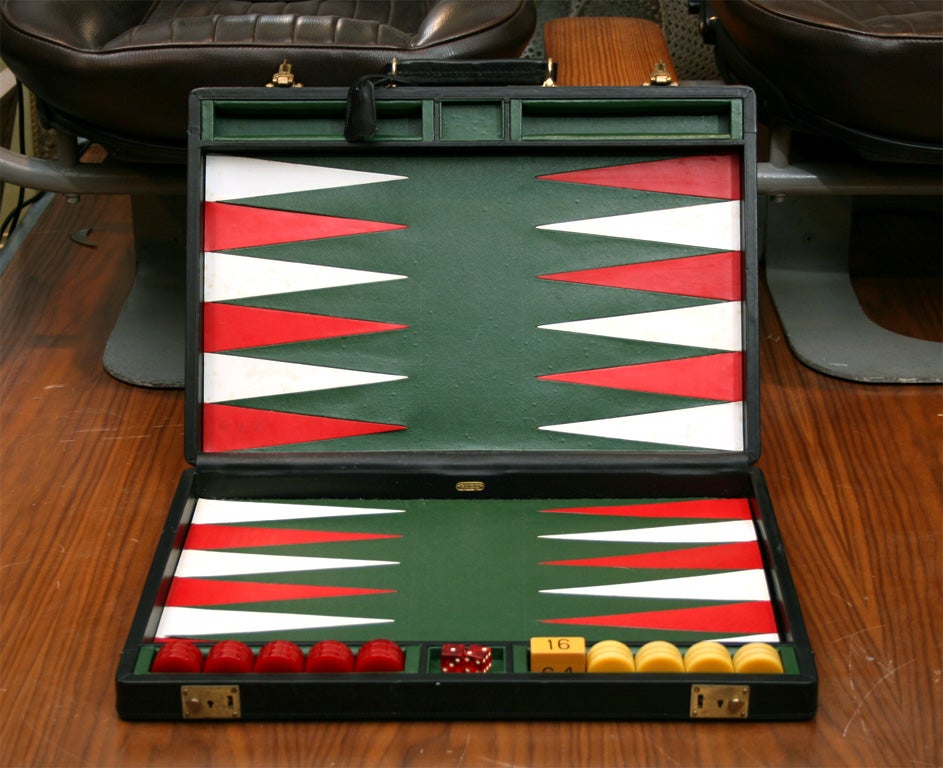 Beautiful, colored leather and Bakelite pieces. Slick and fun. A great gift idea for the backgammon player in your life.