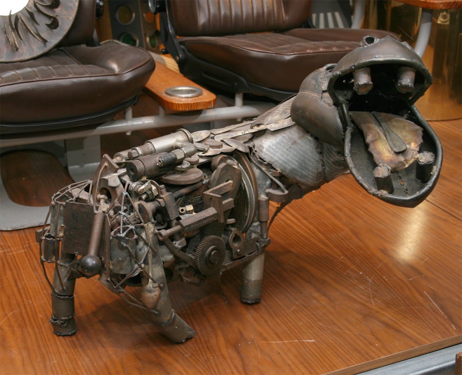Amazing assemblage art sculpture in the form of a hippo. Made of everything the two sculptors could find, from spoons to spark plugs. A truly remarkable piece. By design duo Freidle and Ramirez.