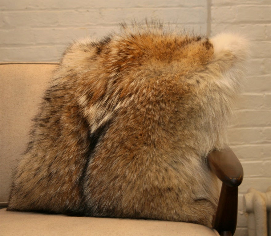 Coyote fur pillows with tan cashmere back and feather and down insert, hidden zipper. Custom made for Quotient.