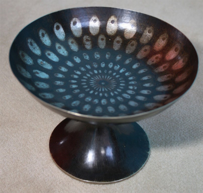 Patinated nickel silver and chased bronze tazza, signed, by Jean Dunand, French, circa 1915<br />
4 1/2