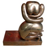 Scultura puzzle in bronzo di un corpo femminile nudo di Miguel Berrocal