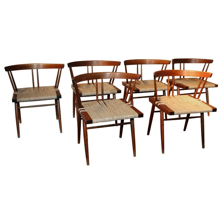 A set of Six and Eight Grass Seat Chairs by George Nakashima