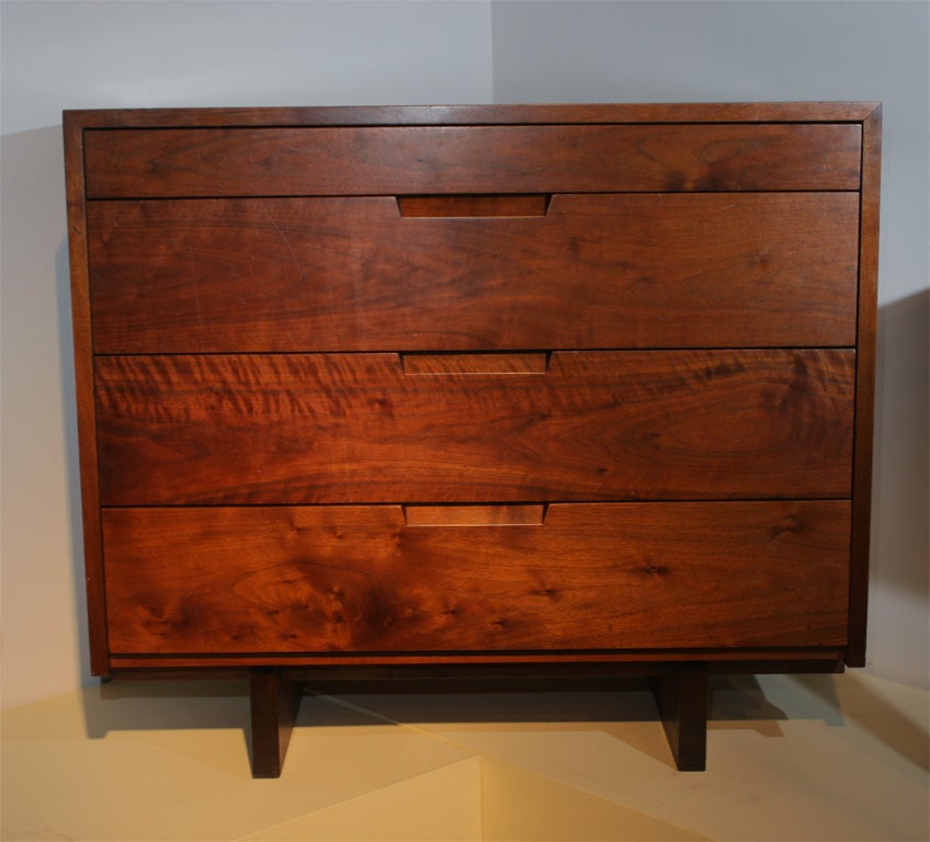 Walnut 4 drawer chest with dovetailed construction.<br />
Original finish. Excellent condition.Beautiful color, great selection of walnut boards used in construction.