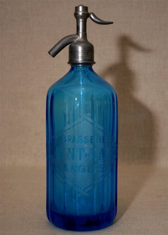 Three Vintage French Colored-Glass Brasserie Soda Bottles with the Following Inscriptions:  <br />
Blue Bottle: 
