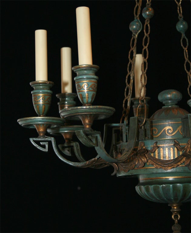 20th Century Painted wood and gilt iron chandelier by E.F. Caldwell For Sale