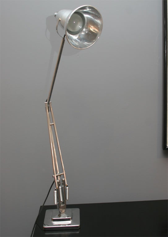 This desk lamp was designed and built in the 1930's in England but has been fully restored, polished, replated and rewired for american homes. They look great in any office space or living room as well as the bedroom. Height varies when extended.